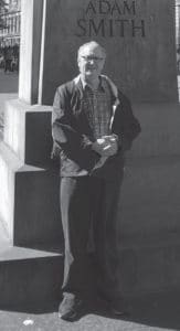 A photo of Neil Davidson in greyscale