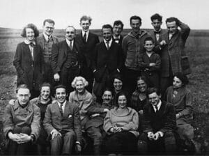 Karl Korsch pictured (middle sitting) in a group photo in a field