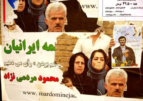 Tehran, 2009. Ahmadinejad’s campaign posters—casting him as “Mahmoud Mardominejad,” Mahmoud of the people—are altered by protesters during the Green Movement.