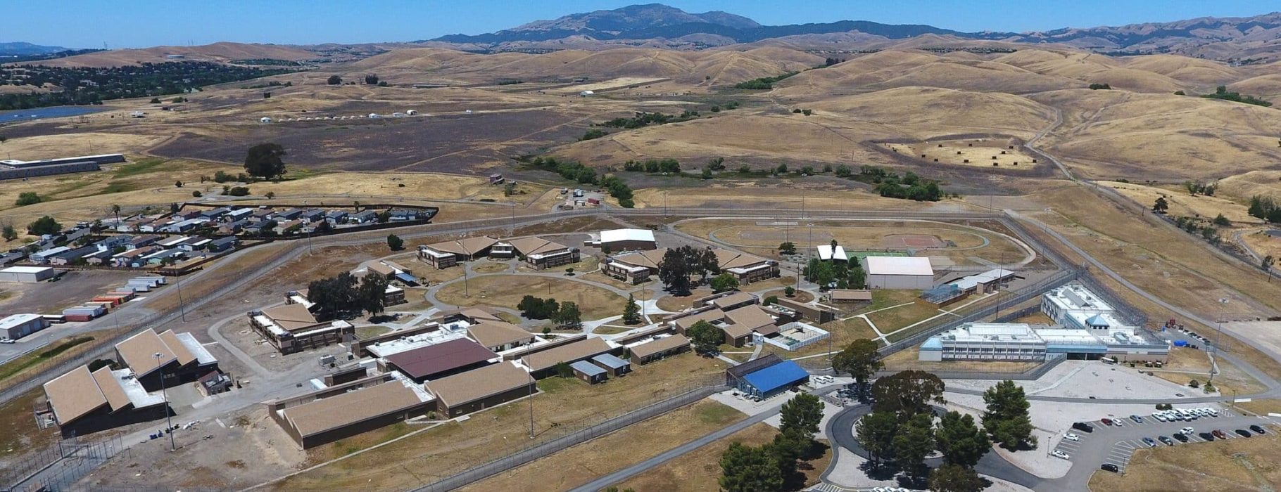 Aerial view of the housing units at Federal Correctional Institution, Dublin. Photo Credit: Jesstess87