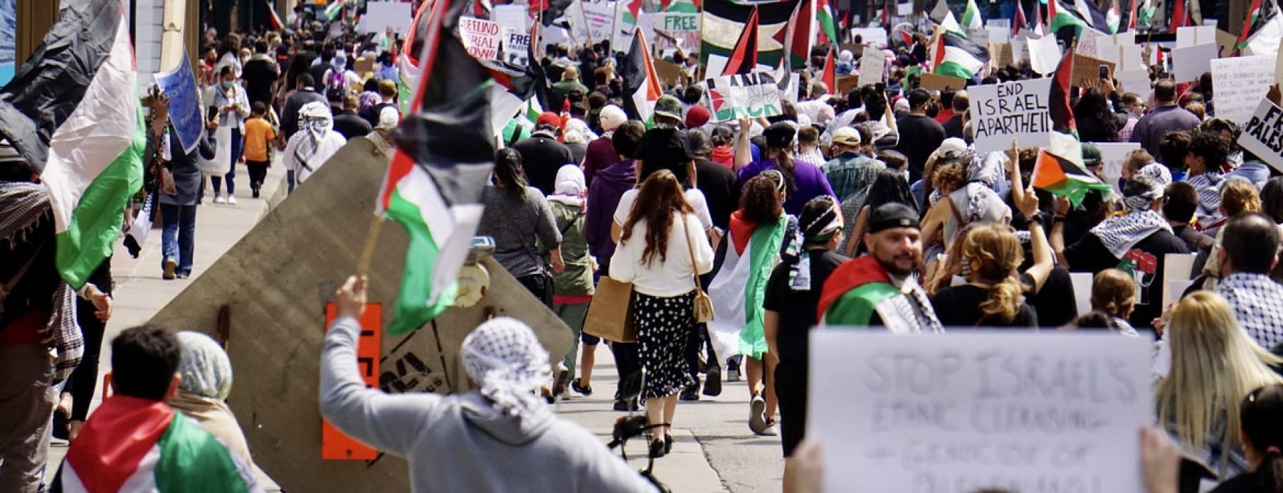 Protestors in Chicago May 2021 Hold Palestinian Flags and March in a Solidarity Demonstration
