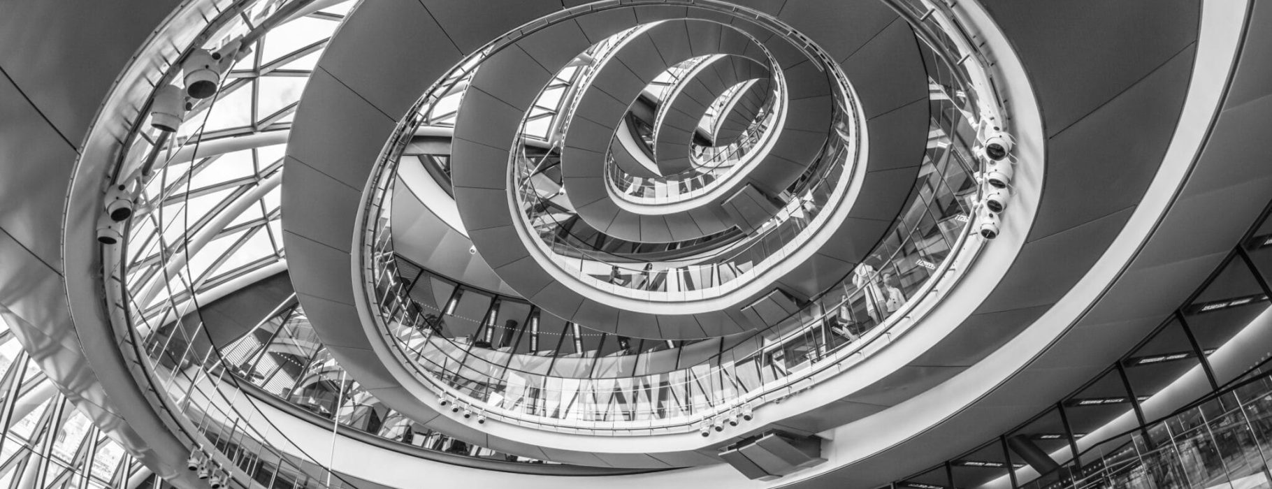 Looking up at the spiral staircase, City Hall of London. Photo Credit: Colin via Wikimedia Commons.