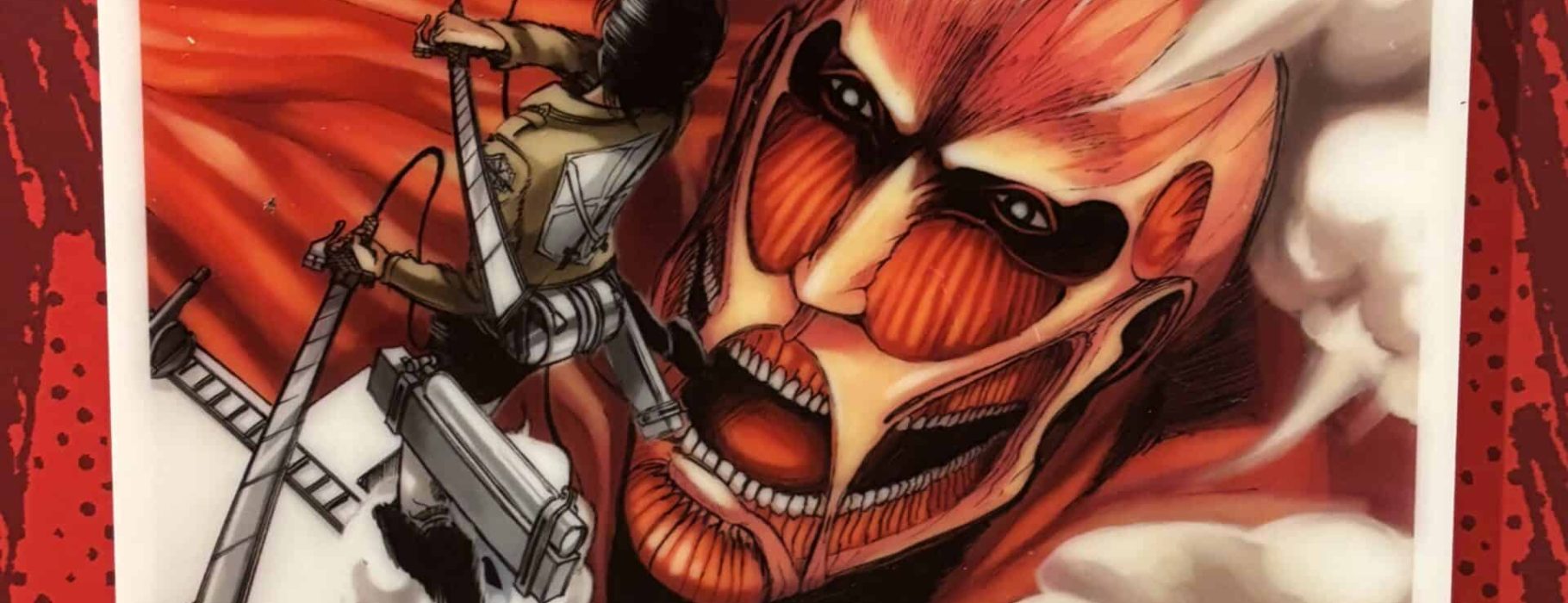 A wall panel at the Attack on Titan installation at Kodansha House in New York City, October 2025. The image, depicting main character Eren Yeager fighting the Colossal Titan, appears on the cover of the first volume of the Attack on Titan manga series, created by Hajime Isayama and published in 2012 by Kodansha.