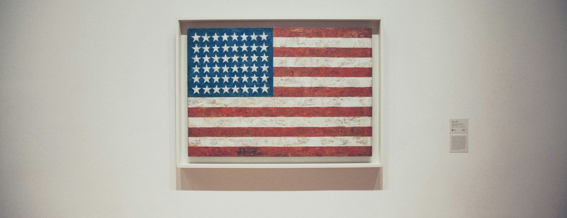 anthony-delanoix-nxpw92fiGw8-unsplash U.S.A. flag on wall with frame Photo Credit: Anthony Delanoix (via Unsplash)